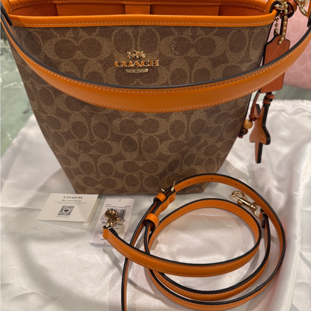 Coach City Bucket Bag with Starfish Charm (Tan/Bright Mandarin)